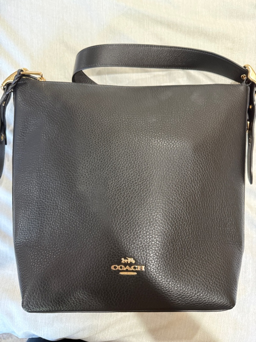 COACH Black Pebbled Leather Messenger Bag with Gold Accents